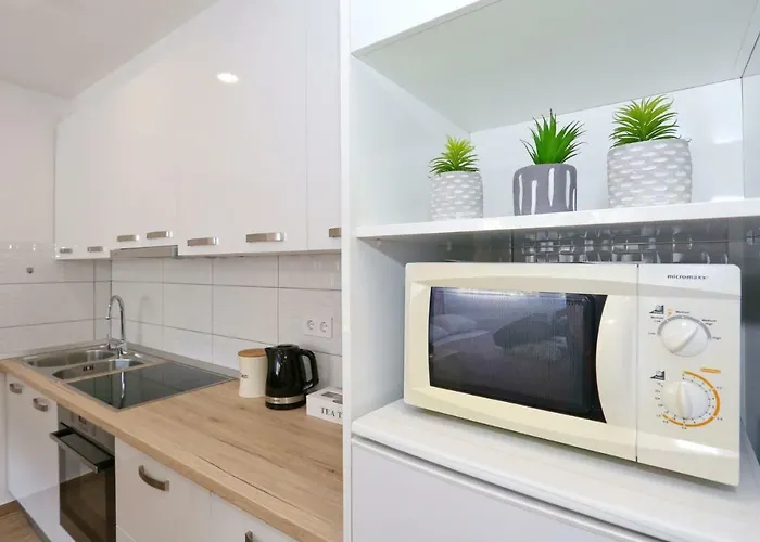 Апартаменты Two New By The Town Center *