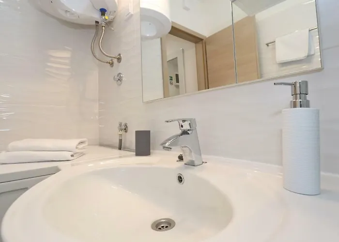 Апартаменты Two New By The Town Center *