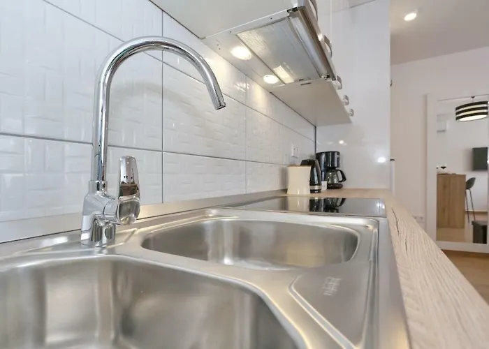 Апартаменты Two New By The Town Center *